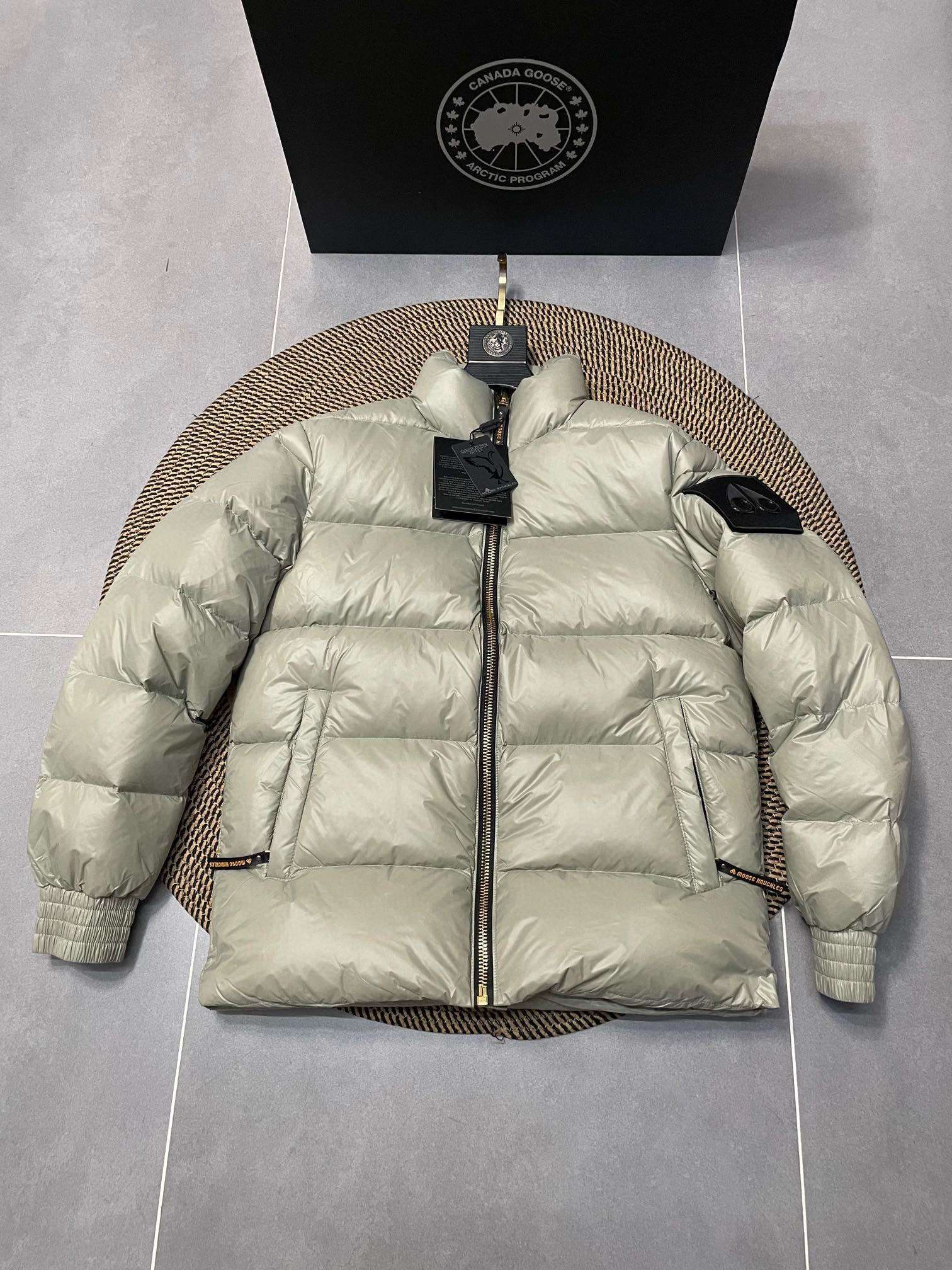 무스너클 남녀공용 패딩